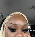 Close-up of blonde hair with a side part
